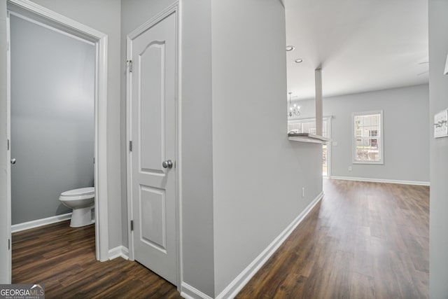 2203 Hyssop Way, Buford, GA 30519 - hallway with dark wood finished floors, a chandelier, and recessed lighting
