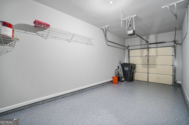 2203 Hyssop Way, Buford, GA 30519 - garage featuring a garage door opener and baseboards