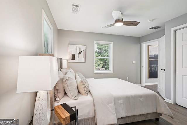 524 Paines Ave NW, Atlanta, GA 30318 - bedroom with wood finished floors and ceiling fan