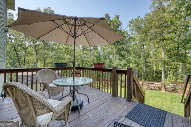 87 Harbin Ct, Morganton, GA 30560 - deck featuring outdoor dining space and a yard