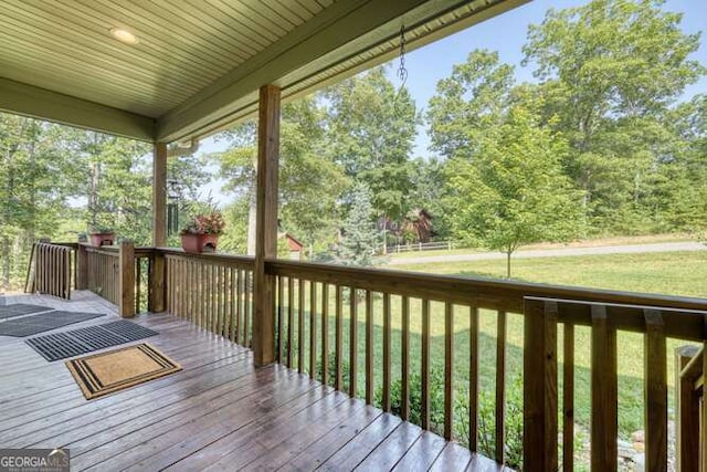 87 Harbin Ct, Morganton, GA 30560 - deck featuring a yard and view of wooded area
