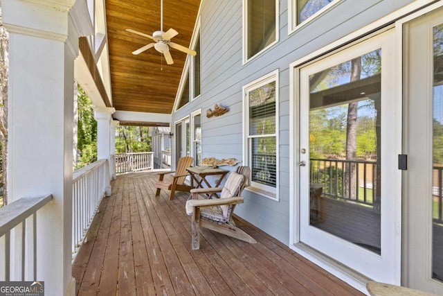 1320 Tal Lewis Rd, White Plains, GA 30678 - wooden porch with a ceiling fan