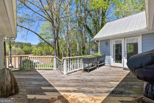 1320 Tal Lewis Rd, White Plains, GA 30678 - wooden deck featuring french doors and a grill
