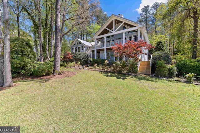 1320 Tal Lewis Rd, White Plains, GA 30678 - view of front of home featuring a front lawn and stairway