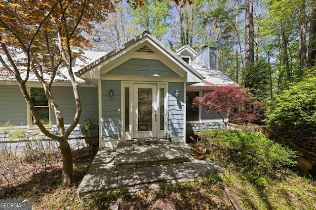 1320 Tal Lewis Rd, White Plains, GA 30678 - view of front facade featuring a chimney