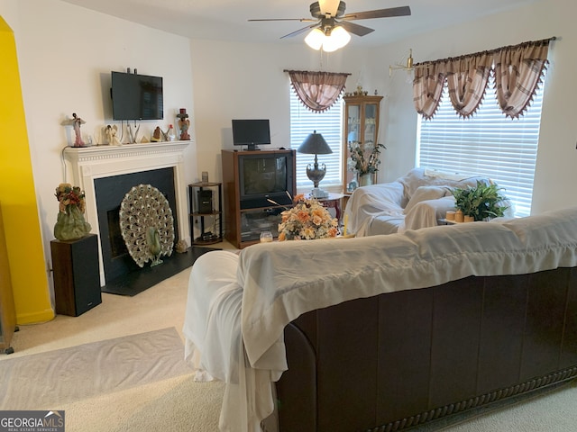 3232 Deer Pause Ln, Decatur, GA 30034 - living room featuring carpet, a ceiling fan, and a fireplace with flush hearth