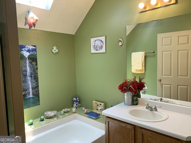 3232 Deer Pause Ln, Decatur, GA 30034 - full bath with vaulted ceiling, vanity, a bath, and a skylight
