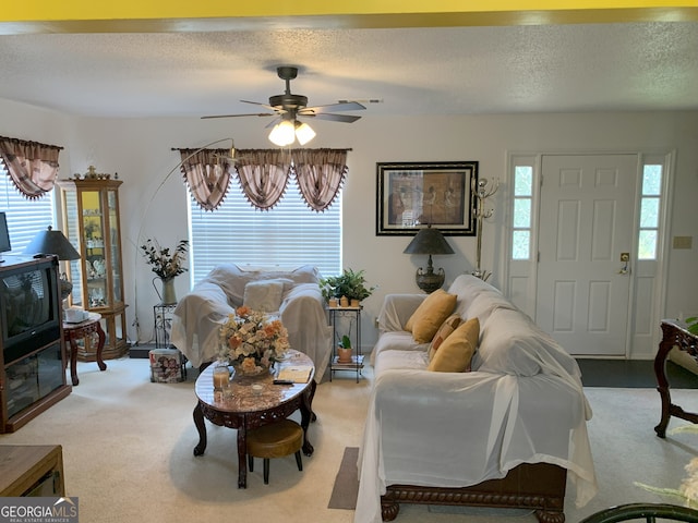 3232 Deer Pause Ln, Decatur, GA 30034 - carpeted living area featuring a textured ceiling and a ceiling fan