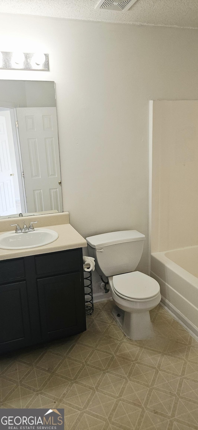 116 Ventura Trl, Stockbridge, GA 30281 - bathroom with vanity, a tub, and tile patterned floors