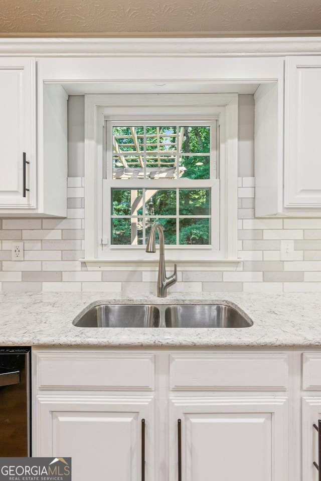 120 Timbervalley Ln, Lawrenceville, GA 30043 - kitchen with decorative backsplash, white cabinets, and light stone countertops