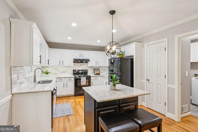 120 Timbervalley Ln, Lawrenceville, GA 30043 - kitchen featuring black appliances, under cabinet range hood, white cabinets, decorative backsplash, and crown molding