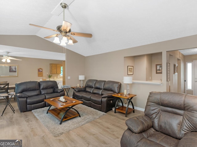 2866 Rosecommons Dr, Hampton, GA 30228 - living room with ceiling fan, light wood-style flooring, and lofted ceiling