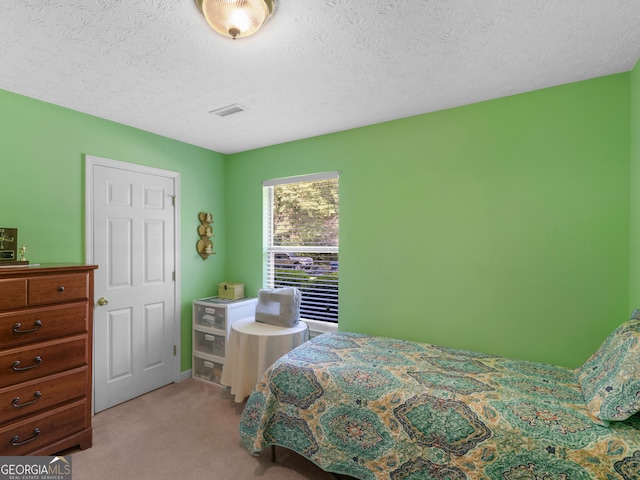 2866 Rosecommons Dr, Hampton, GA 30228 - bedroom with light carpet and a textured ceiling