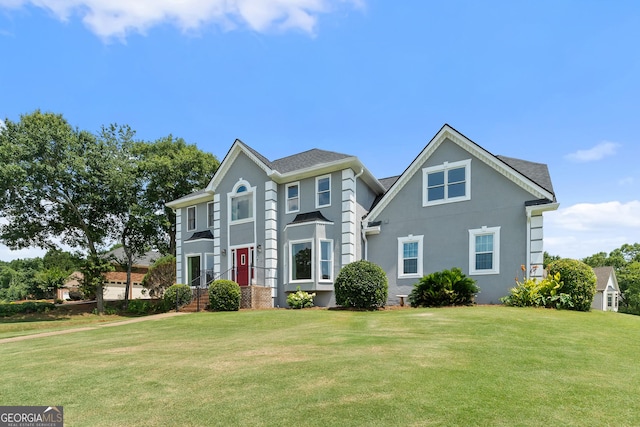 11 Chad Ct, Mcdonough, GA 30253 - colonial home with a front yard and stucco siding