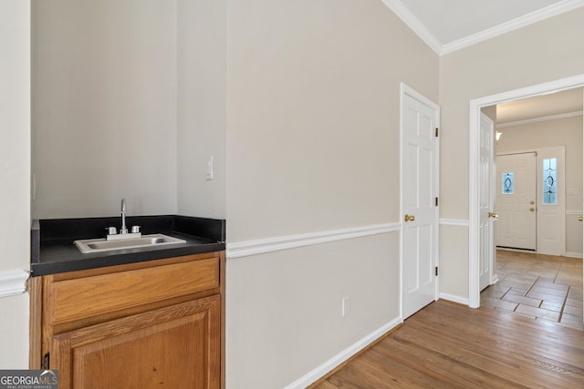 11 Chad Ct, Mcdonough, GA 30253 - indoor wet bar featuring ornamental molding and light wood-style flooring