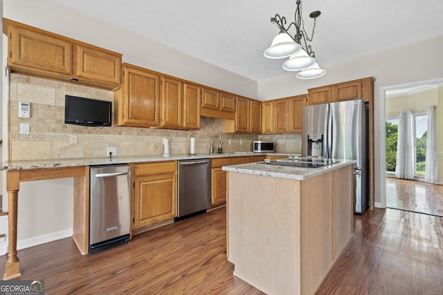 11 Chad Ct, Mcdonough, GA 30253 - kitchen featuring appliances with stainless steel finishes, dark wood-type flooring, backsplash, and light stone counters