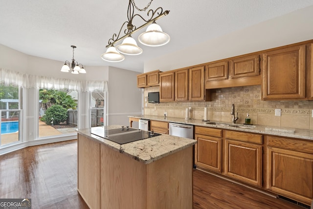 11 Chad Ct, Mcdonough, GA 30253 - kitchen featuring black electric stovetop, tasteful backsplash, light stone counters, brown cabinetry, and a textured ceiling