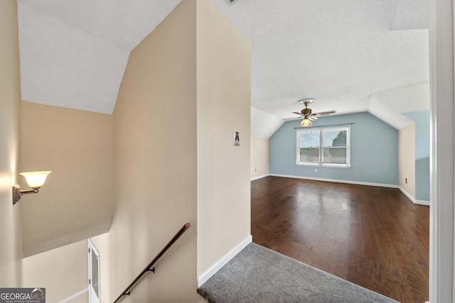 11 Chad Ct, Mcdonough, GA 30253 - additional living space featuring lofted ceiling, ceiling fan, and dark wood finished floors