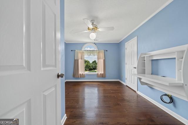 11 Chad Ct, Mcdonough, GA 30253 - entryway featuring ceiling fan, ornamental molding, wood finished floors, and a textured ceiling