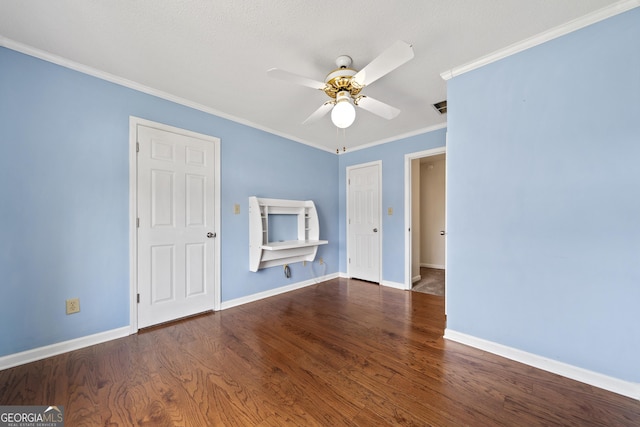 11 Chad Ct, Mcdonough, GA 30253 - empty room with a ceiling fan, ornamental molding, and wood finished floors