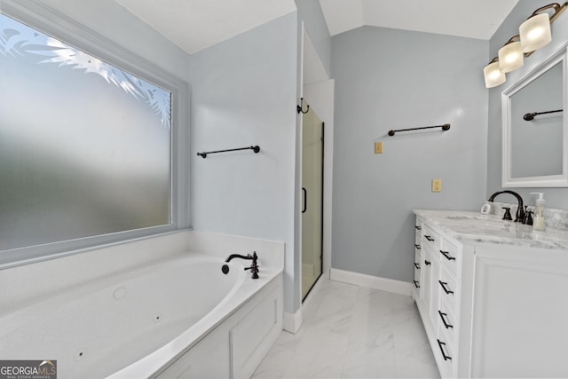 11 Chad Ct, Mcdonough, GA 30253 - bathroom featuring marble look tiles, a tub with jets, vanity, a shower stall, and lofted ceiling