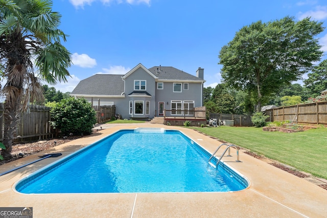 11 Chad Ct, Mcdonough, GA 30253 - view of swimming pool featuring a deck and a fenced backyard