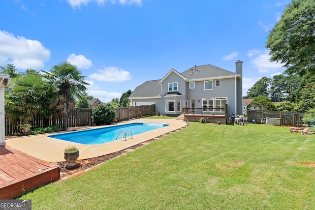 11 Chad Ct, Mcdonough, GA 30253 - view of pool with a wooden deck and a fenced backyard