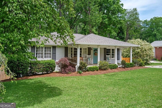 963 Turner Dr SE, Smyrna, GA 30080 - single story home with a porch, a front lawn, brick siding, and a shingled roof