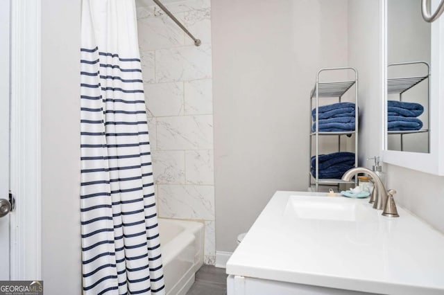 963 Turner Dr SE, Smyrna, GA 30080 - bathroom featuring vanity and shower / bath combo with shower curtain
