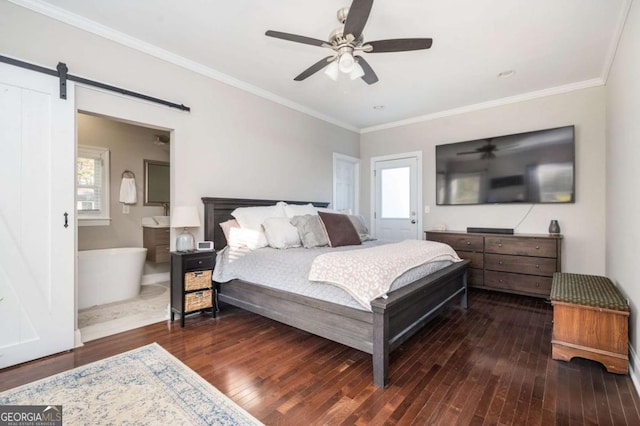 963 Turner Dr SE, Smyrna, GA 30080 - bedroom featuring hardwood / wood-style flooring, crown molding, a barn door, a ceiling fan, and connected bathroom