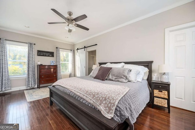 963 Turner Dr SE, Smyrna, GA 30080 - bedroom featuring dark wood finished floors, crown molding, and a ceiling fan