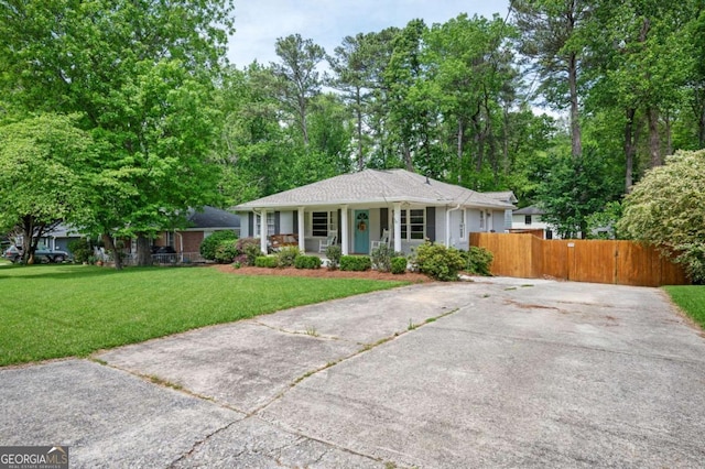 963 Turner Dr SE, Smyrna, GA 30080 - ranch-style home with driveway and covered porch