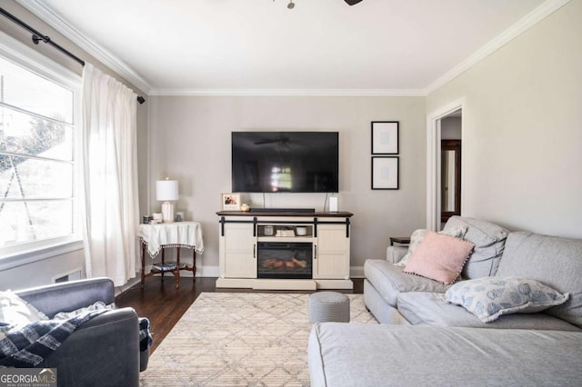 963 Turner Dr SE, Smyrna, GA 30080 - living area with dark wood-type flooring, ornamental molding, plenty of natural light, and ceiling fan