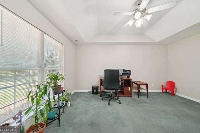600 Cowan Rd, Covington, GA 30016 - home office with a raised ceiling, carpet flooring, and a ceiling fan