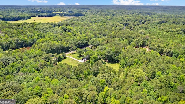 152 Bear Creek Rd, Moreland, GA 30259 - aerial view of property and surrounding area featuring a heavily wooded area