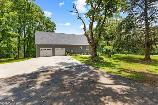 152 Bear Creek Rd, Moreland, GA 30259 - view of front of home featuring driveway, a garage, a front yard, and roof with shingles