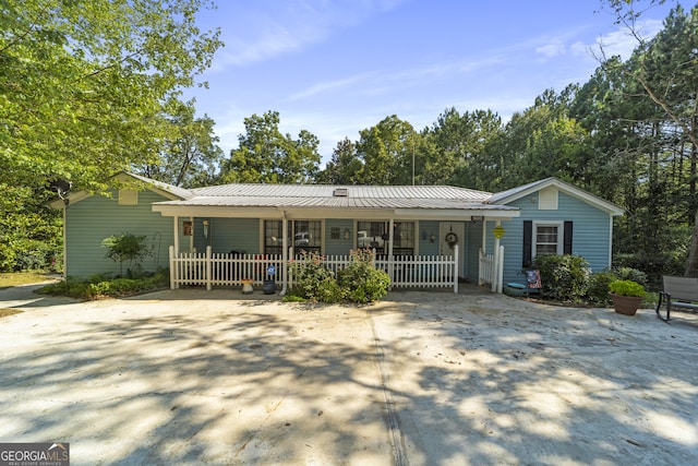 303 Cherokee St, Pine Mountain, GA 31822 - ranch-style house featuring covered porch and a metal roof