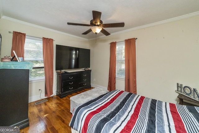 303 Cherokee St, Pine Mountain, GA 31822 - bedroom with wood finished floors, crown molding, and a ceiling fan