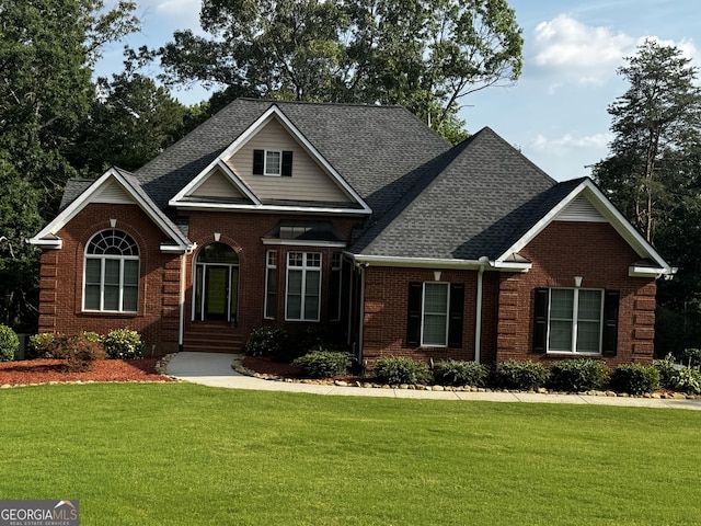131 Winesap Way, Clarkesville, GA 30523 - traditional home with brick siding, a front lawn, and roof with shingles
