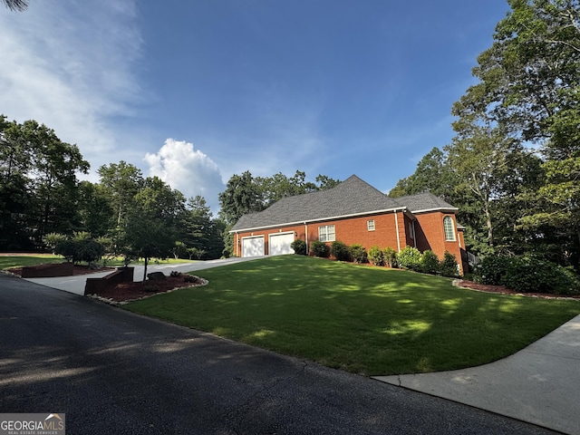 131 Winesap Way, Clarkesville, GA 30523 - view of front of home with a garage, a front yard, driveway, and brick siding