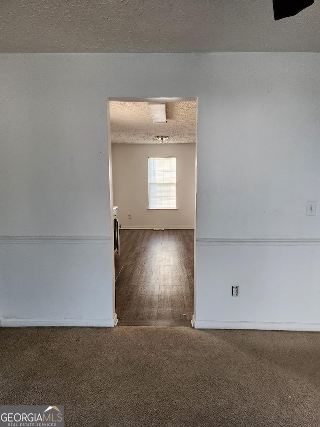 3059 Brass Dr, Austell, GA 30106 - unfurnished room featuring carpet and a textured ceiling