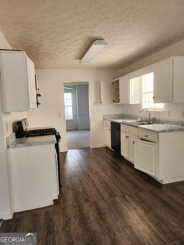 3059 Brass Dr, Austell, GA 30106 - kitchen featuring stainless steel gas range oven, dishwasher, open shelves, a textured ceiling, and dark wood-style floors