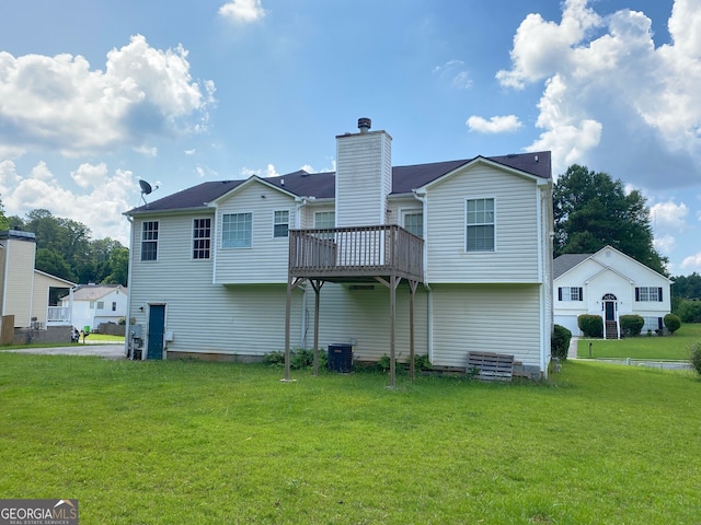 3059 Brass Dr, Austell, GA 30106 - back of property with a yard, a wooden deck, and a chimney