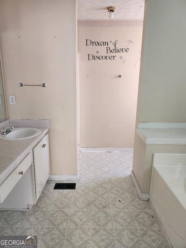 3059 Brass Dr, Austell, GA 30106 - bathroom with vanity, tile patterned floors, and a garden tub