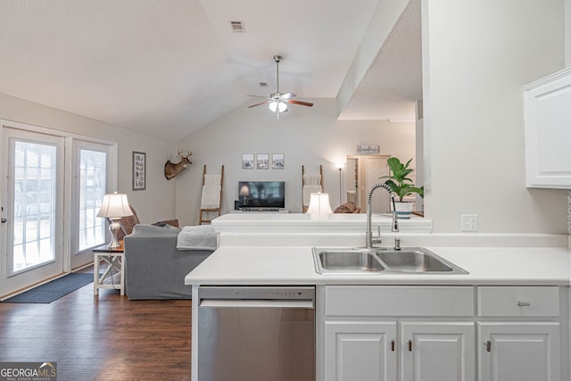 231 Brookstone Ct, Rincon, GA 31326 - kitchen with stainless steel dishwasher, open floor plan, ceiling fan, white cabinetry, and vaulted ceiling