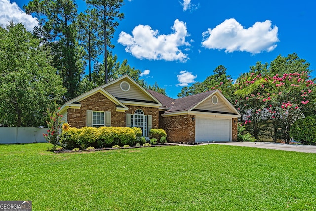 231 Brookstone Ct, Rincon, GA 31326 - view of front of home with brick siding, an attached garage, and concrete driveway