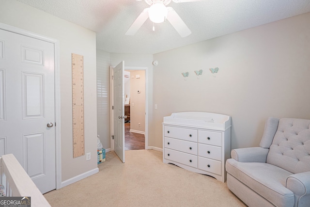 231 Brookstone Ct, Rincon, GA 31326 - living area with carpet floors, ceiling fan, and a textured ceiling