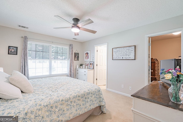 231 Brookstone Ct, Rincon, GA 31326 - bedroom with light carpet, a textured ceiling, and ceiling fan