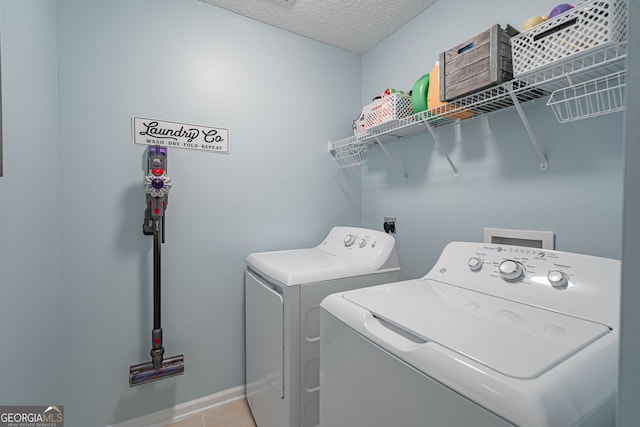 231 Brookstone Ct, Rincon, GA 31326 - laundry room with washer and dryer, a textured ceiling, and tile patterned floors