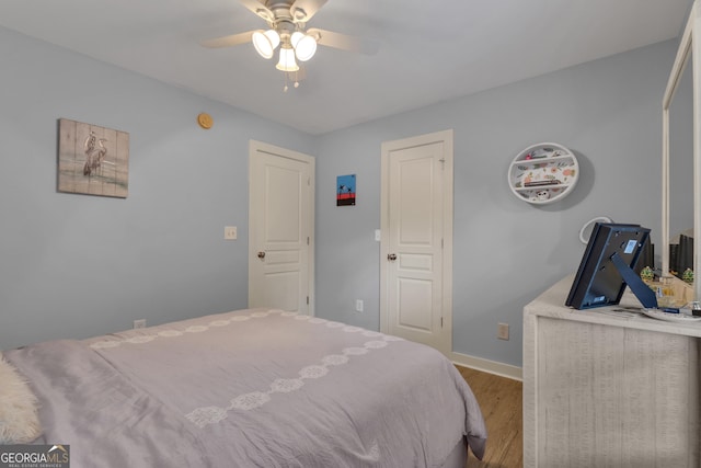 14 Hammock Ridge Dr, Newnan, GA 30265 - bedroom with wood finished floors and ceiling fan